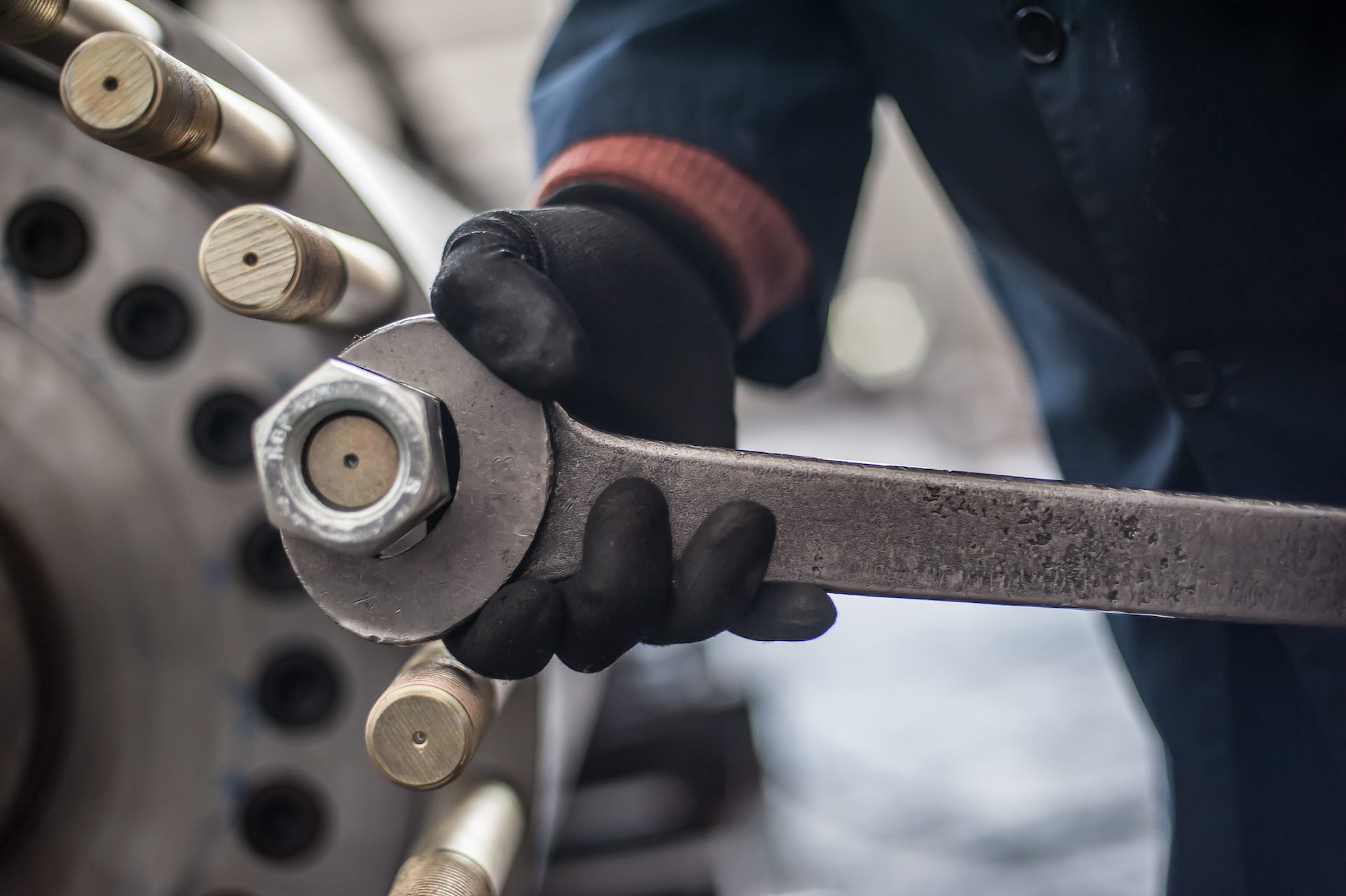 Mechanic screws big bolt with large and heavy wrench key